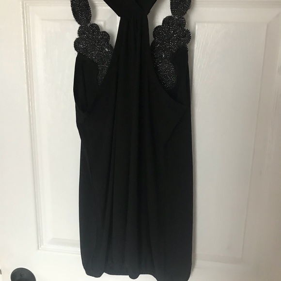 Black top with embellishments. - Picture 2 of 3